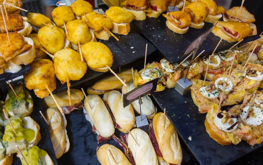 Pintxos Different Spanish foods on a bar
